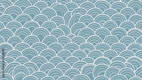 Traditional Japanese wave pattern in shades of blue and white creating a rhythmic and calming texture for various decorative background uses.
