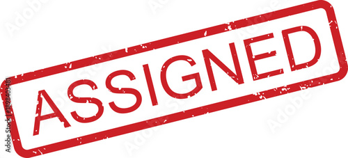 Official red rubber stamp with the word ASSIGNED indicating a task or role has been designated