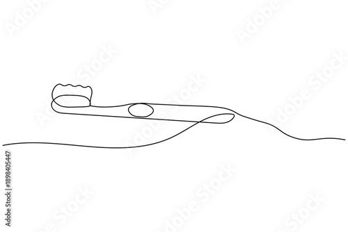 A minimalist continuous one line drawing of a toothbrush on a white background, perfect for dental health and oral hygiene design concepts in a modern vector style.