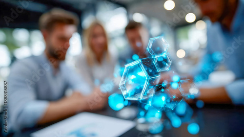 Business team collaborating at a table with futuristic hologram and hexagon network overlay, technology and analytics concept