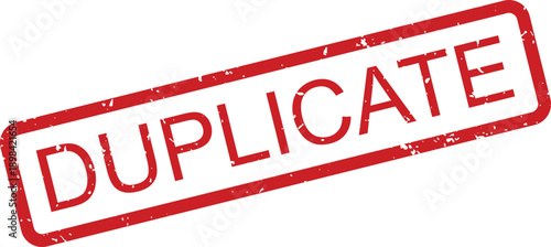 Red rectangular rubber stamp with a grunge texture displaying the word DUPLICATE on a white surface