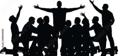 Silhouette of a group of people with arms raised in celebration