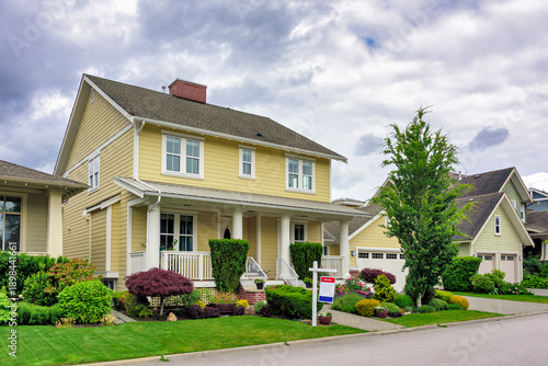 A perfect neighborhood. Nicely landscaped front yard of luxury residential house for sale