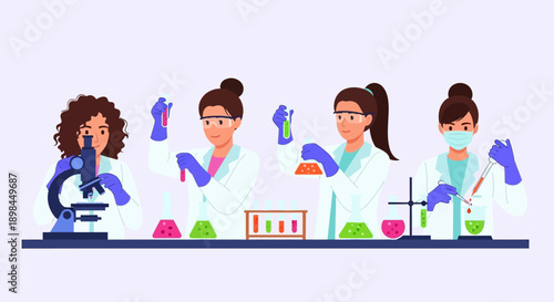 Four female scientists conducting experiments in a laboratory setting.