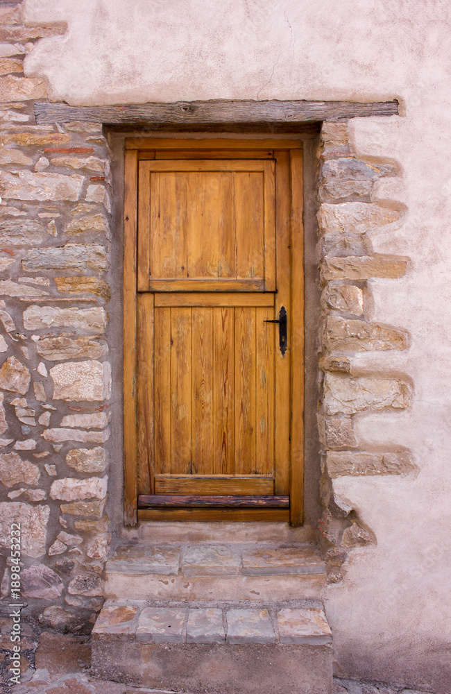 Fototapeta premium Wooden door in old building