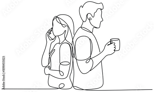 Couple back to back with one on phone and other holding coffee cup