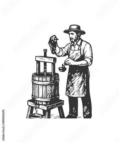 Vintner making wine using traditional grape press