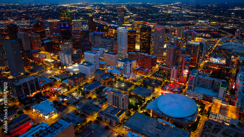 Houston downtown night aerial. Night aerial view of downtown Houston illuminated with city lights.