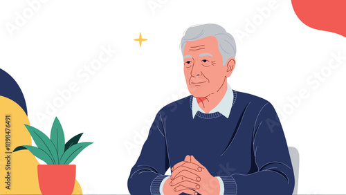 Calm elderly man with gray hair wearing a blue sweater sitting at a desk next to a potted plant with a peaceful and content facial expression.