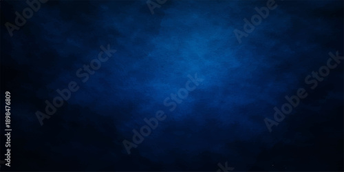 Dark blue abstract grunge background with clouds and stormy sky