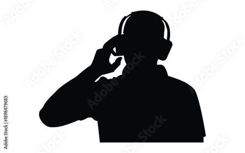 Man wearing headphones silhouette listening to music