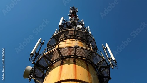 Communications tower with antennas.