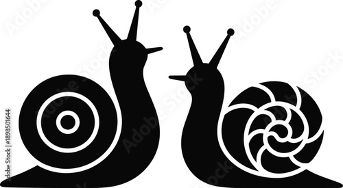 Snail silhouette set showing cute garden snails with spiral shells in minimal black illustration design