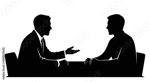 Two businessmen engaged in a serious discussion in a professional setting
