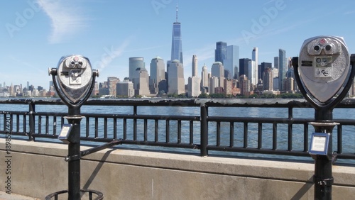 New York City Manhattan Downtown Financial District skyline, World Trade Center from New Jersey Liberty state park, United States. Hudson river waterfront cityscape, skyscraper buildings, tower viewer