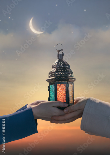 Ornamental Arabic lantern with burning candle © Konstantin Yuganov