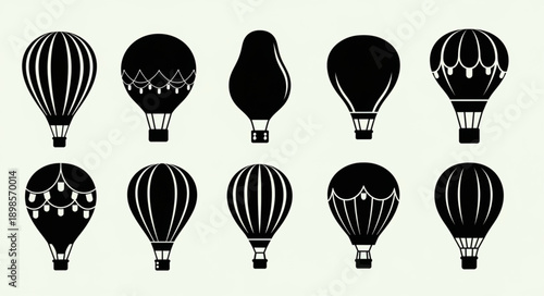 Collection of black hot air balloon silhouettes on a light background.
