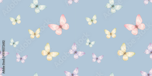 Watercolor pastel butterflies seamless pattern on soft blue background, perfect for spring designs, nursery decor, wallpapers, textiles and gentle seasonal projects