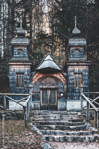 Картината върху платно view of a small wooden church in the forest of slovenia, triglav park