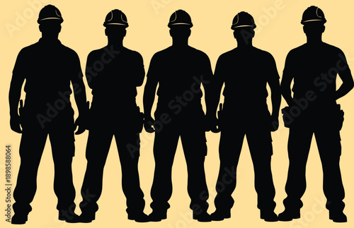 Silhouettes of five construction workers standing together in uniform