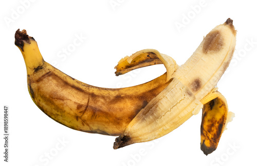 Konstfotografi A rotten banana in its peel on a white background