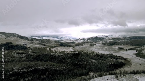 Aerial view of a landscape in Yellowstone Park in winter under the snow