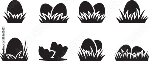 Various black silhouettes showing whole and cracked Easter eggs nestled in green grass patches