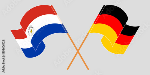 Crossed and waving flags of Republic of Paraguay and Germany. Vector illustration