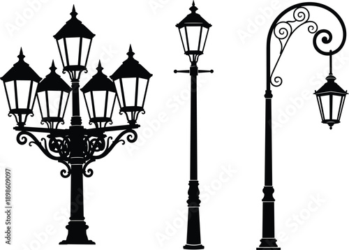 Ornate vintage street lamps and a multi-headed lamppost in silhouette Keywords: street lamp, lamppost, vintage, ornate, antique