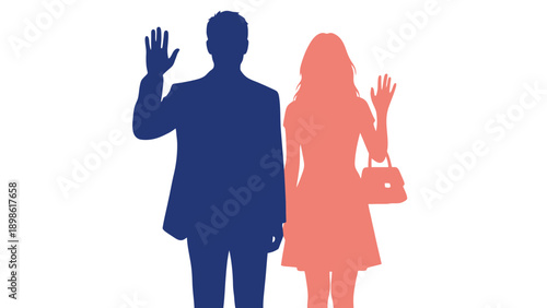A man and woman in silhouette waving at something in front of them