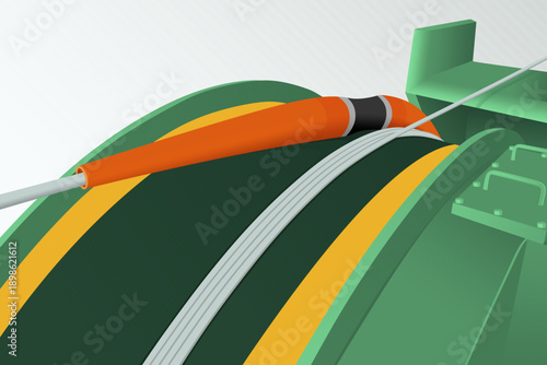 Fiber optic cable with joint box passes through cable machine in submarine cable laying.