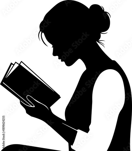 Side Profile Silhouette of a Young Woman Engrossed in Reading a Book, Concept of Learning and Quiet Reflection