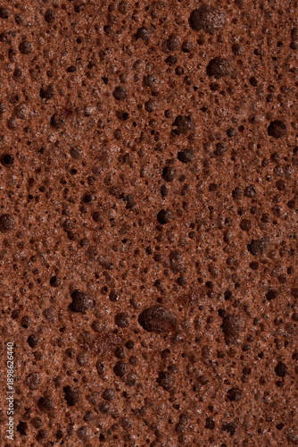 Foto Chocolate sponge cake texture with porous crumb structure