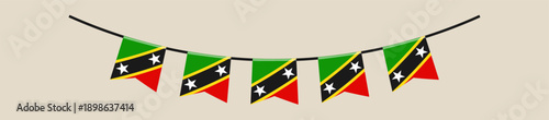 Saint Kitts and Nevis flag bunting banner hanging on a string for national holiday celebration, festive vector.