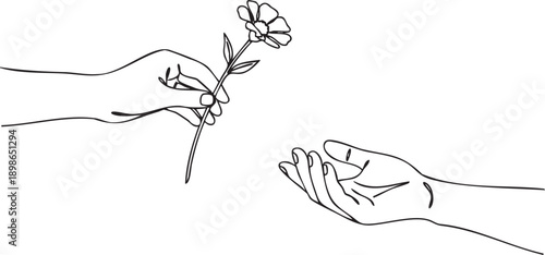 A delicate flower being passed from one hand to another in a tender gesture