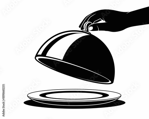 Hand holding a cloche over an empty plate in a simple elegant presentation style