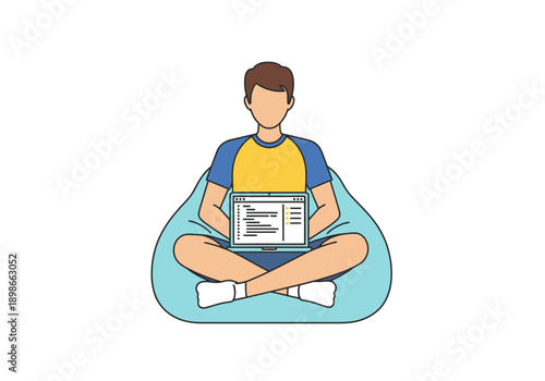 Young man with laptop coding on bean bag chair on white background with blue and yellow shirt and white socks