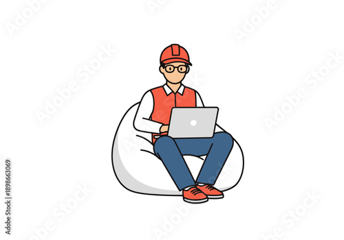 Young Man Wearing Hard Hat And Vest Works On Laptop While Seated On Beanbag Chair With White Background Ideal For Lifestyle And Technology Concepts