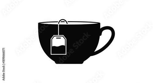 A simple black graphic depicts a full mug with a tea bag steeping inside presented as a silhouette high quality