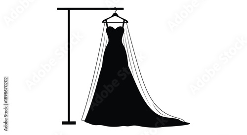 A striking black silhouette of a flowing strapless wedding gown hanging on a rack showcasing elegant design silhouette high quality