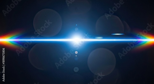 Bright Blue Lens Flare with Rainbow Spectrum on Dark Background.