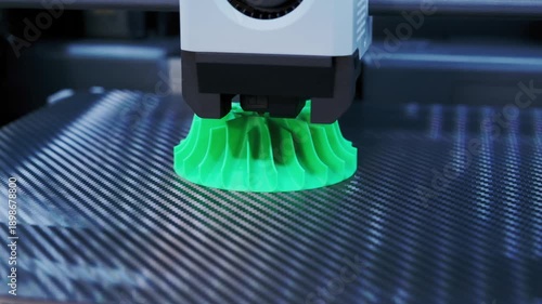 Closeup Shot of Creating Green Vase With a 3D Printer in a Workshop Setting