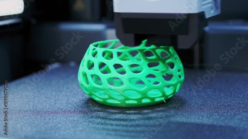 Closeup View of 3D Printing a Green Vase With Intricate Lattice Design Using Advanced Technology