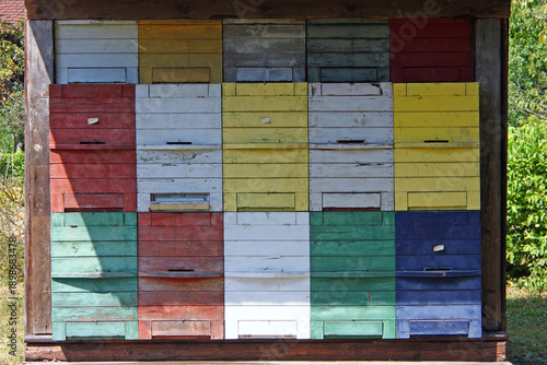 A lot of bee hives under the same roof