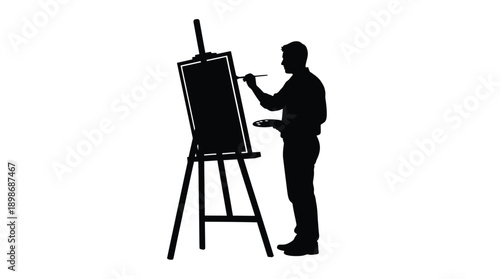 Artist painting at an easel a striking black silhouette