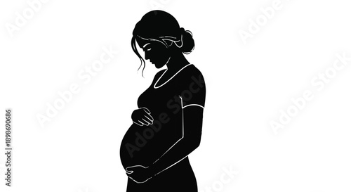 Pregnant woman silhouette cradling belly in black