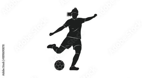 Silhouette of a woman playing soccer kicking a ball in motion