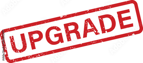 A red rectangular rubber stamp showcases the prominent word UPGRADE against a clean white backdrop