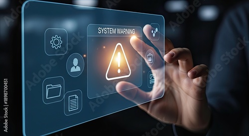 Hand touching virtual screen with system warning icon.