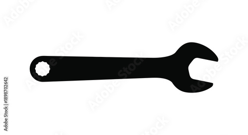 A stark black silhouette of a common open end wrench a tool used for gripping and turning fasteners silhouette high quality